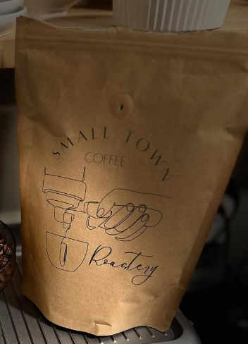 Bag of medium roast coffee on a wooden table